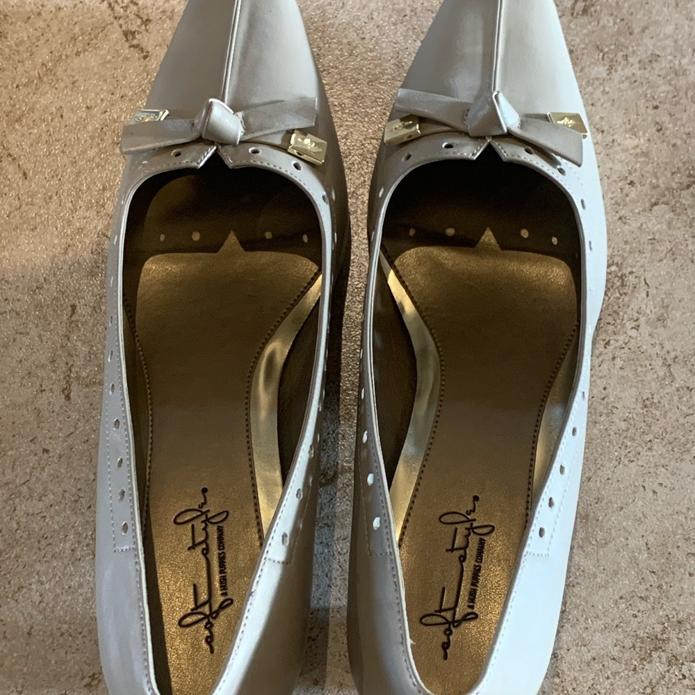 Beige /tan heels , have not been worn at all.